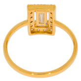 Elegant gold ring featuring a rectangular diamond center and intricate detailing, perfect for a luxurious style.